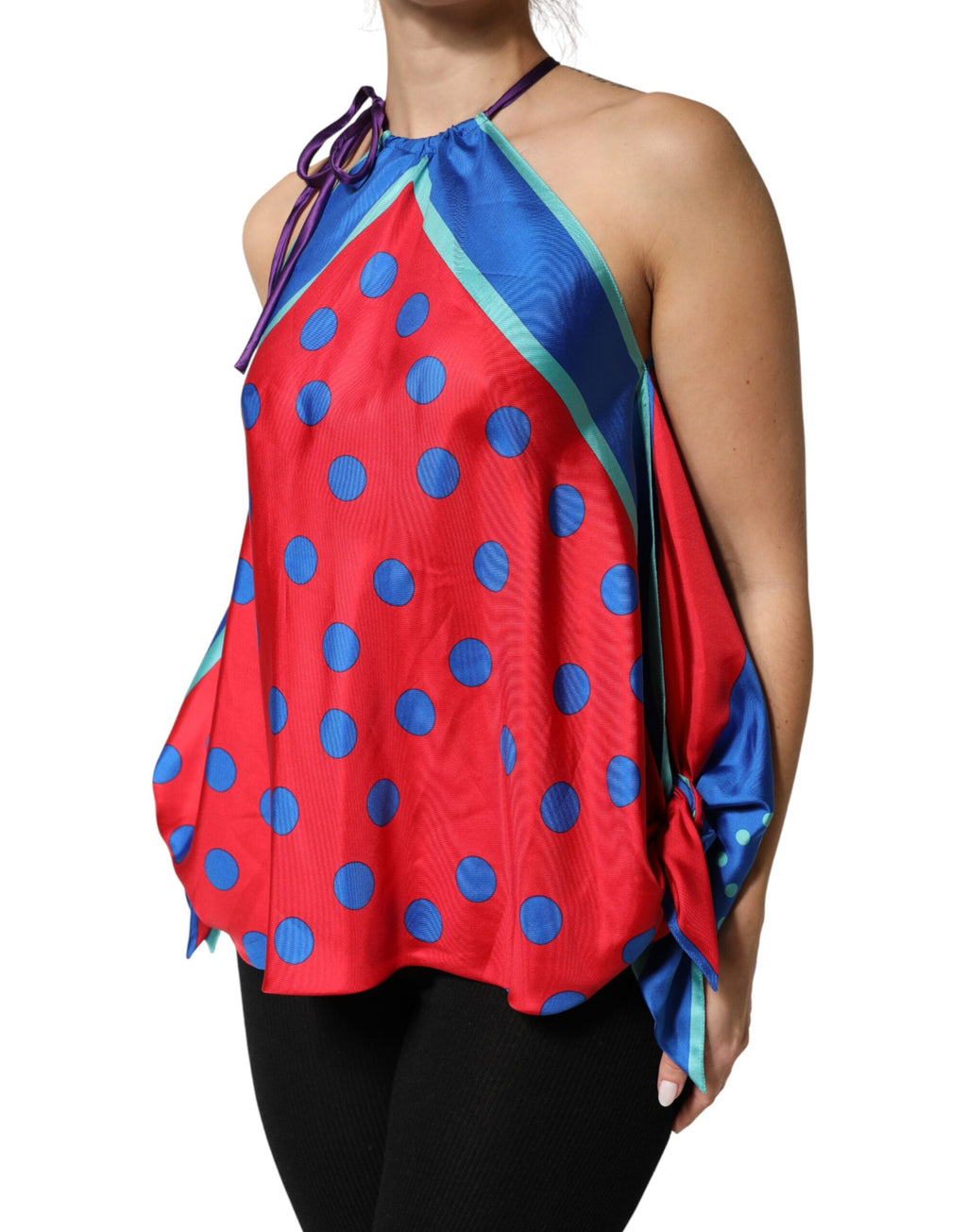 Haut Dolce & Gabbana à pois multicolores en forme de cravate et encolure halter, tissu léger et élégant.