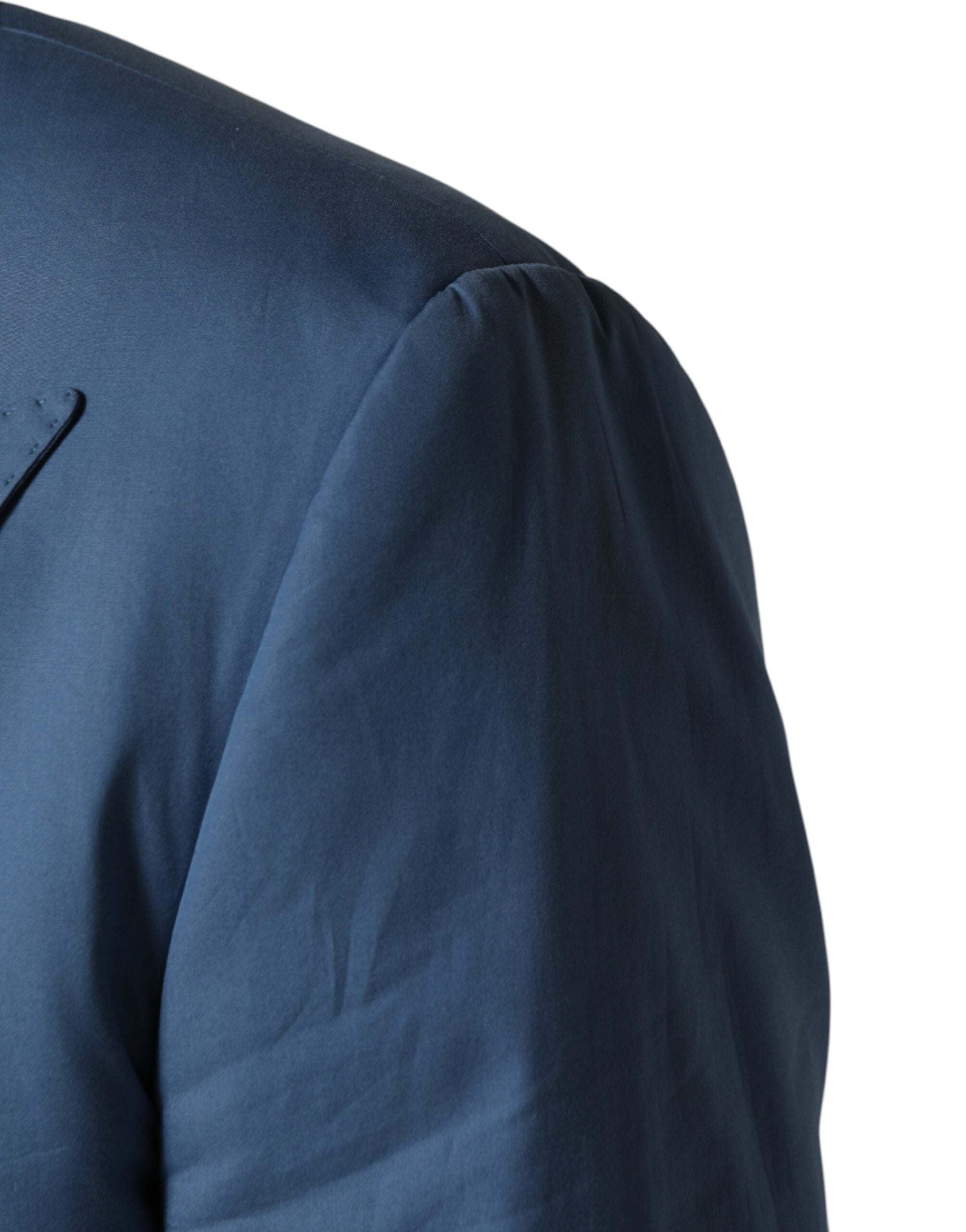 Costume deux pièces en coton bleu Dolce & Gabbana avec veste croisée à double boutonnage, élégant et moderne.