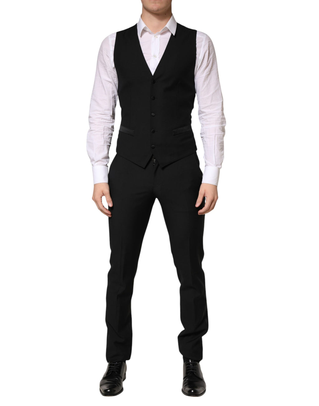 Costume homme noir en laine Dolce & Gabbana à trois pièces, veste à simple boutonnage et pantalon élégant.