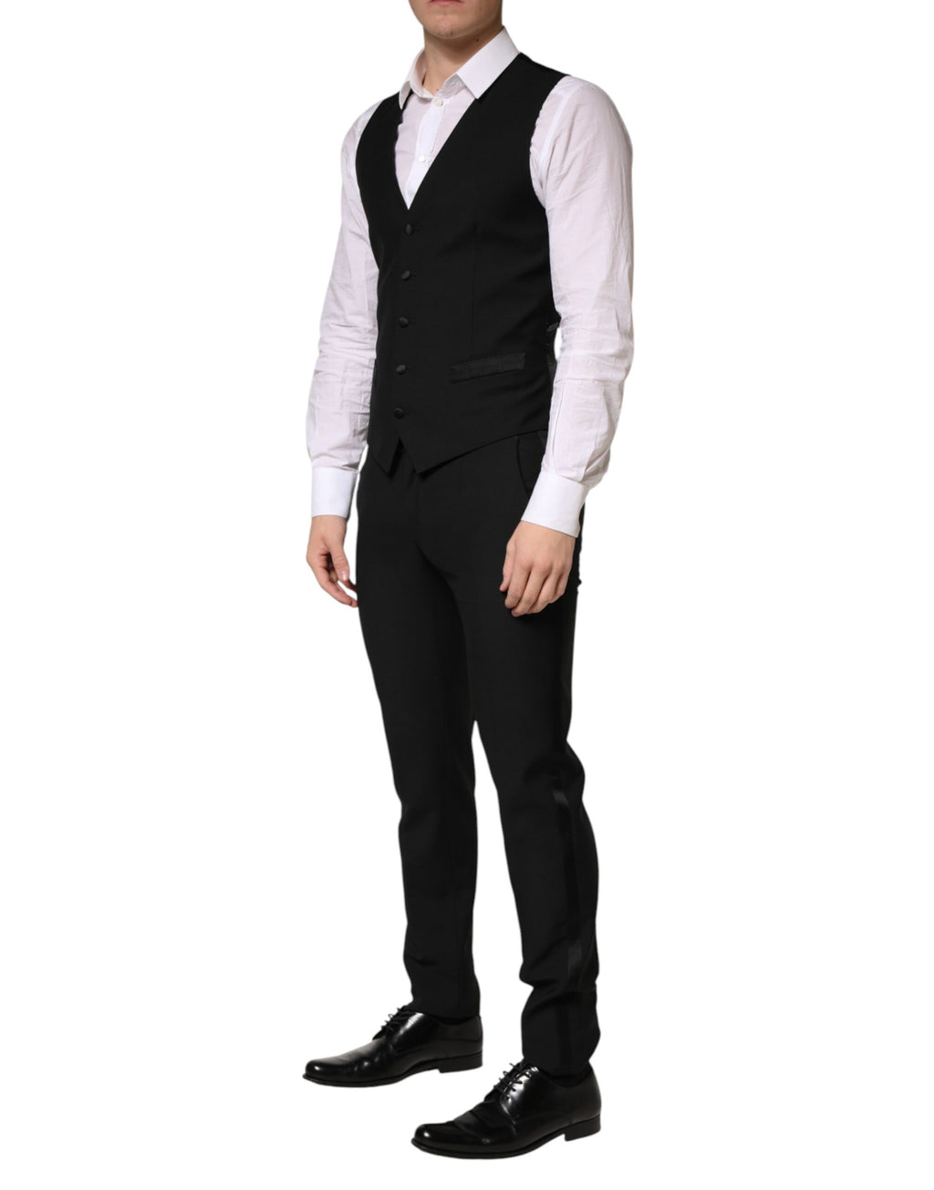 Costume homme noir en laine Dolce & Gabbana à trois pièces, veste à un bouton et pantalon élégant, pour occasion formelle.