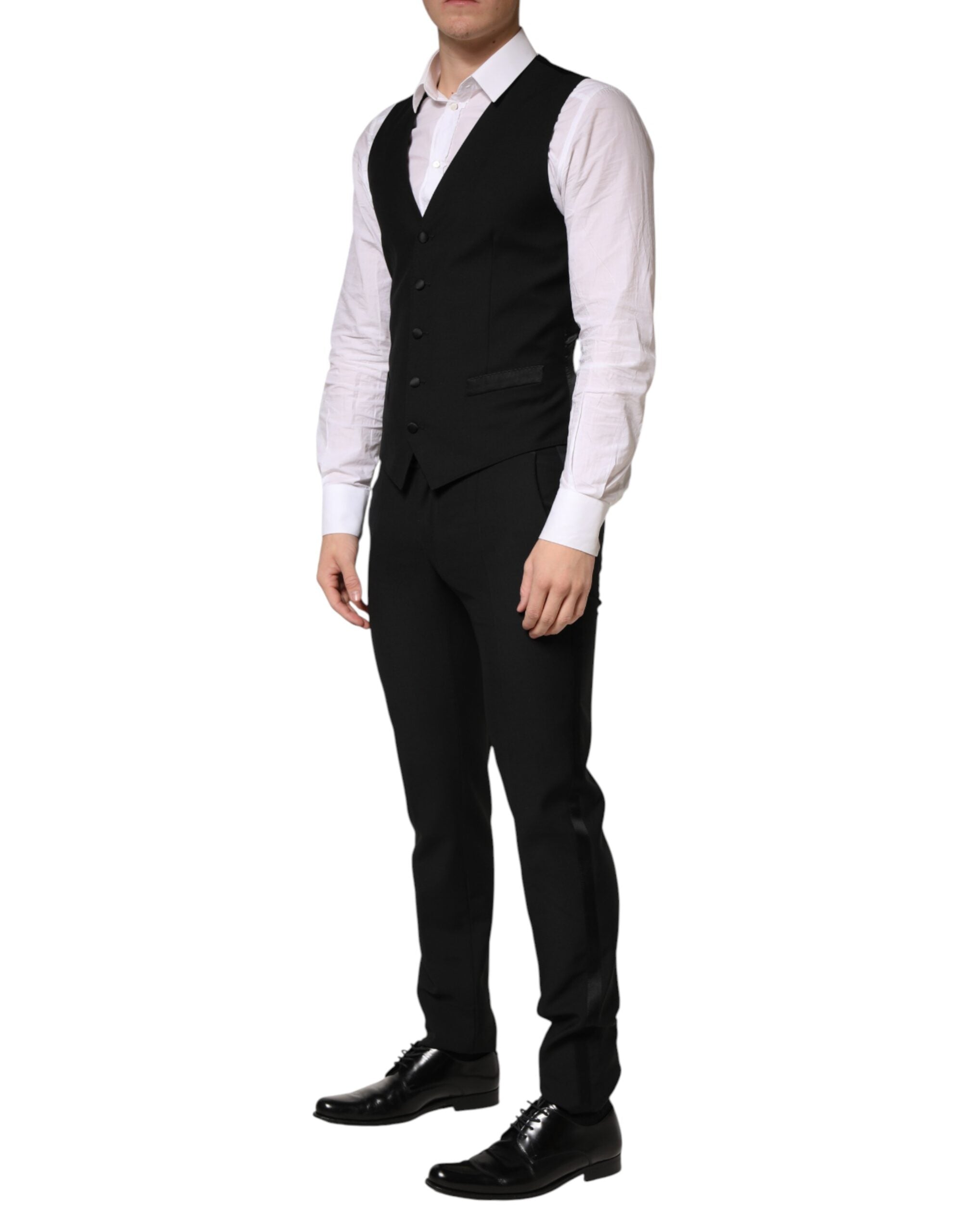 Costume homme noir en laine Dolce & Gabbana à trois pièces, veste à un bouton et pantalon élégant, pour occasion formelle.