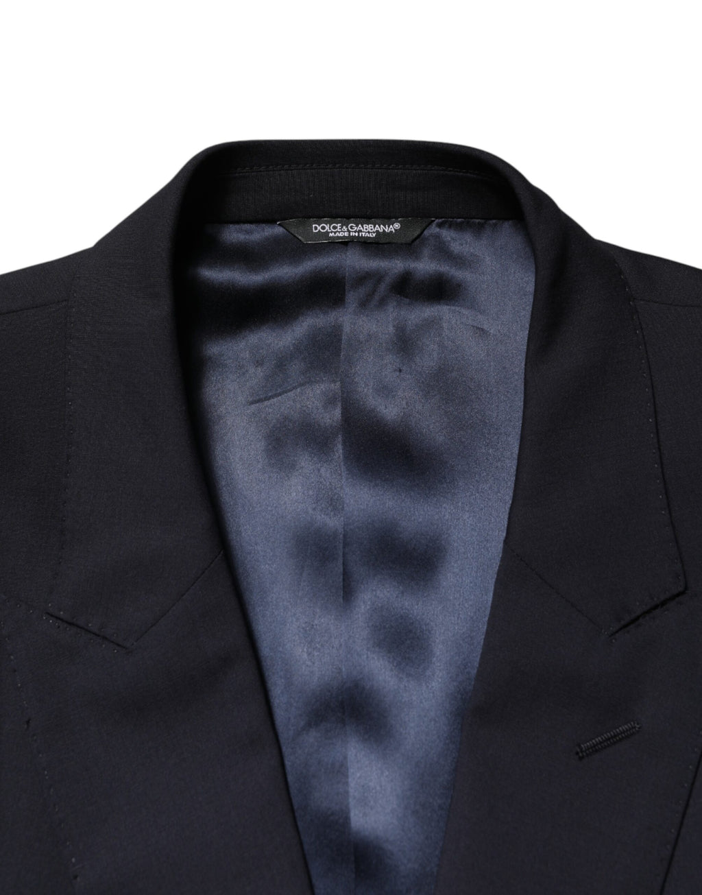 Costume homme bleu en laine Dolce & Gabbana, costume croisé à double boutonnage, élégant et sophistiqué.