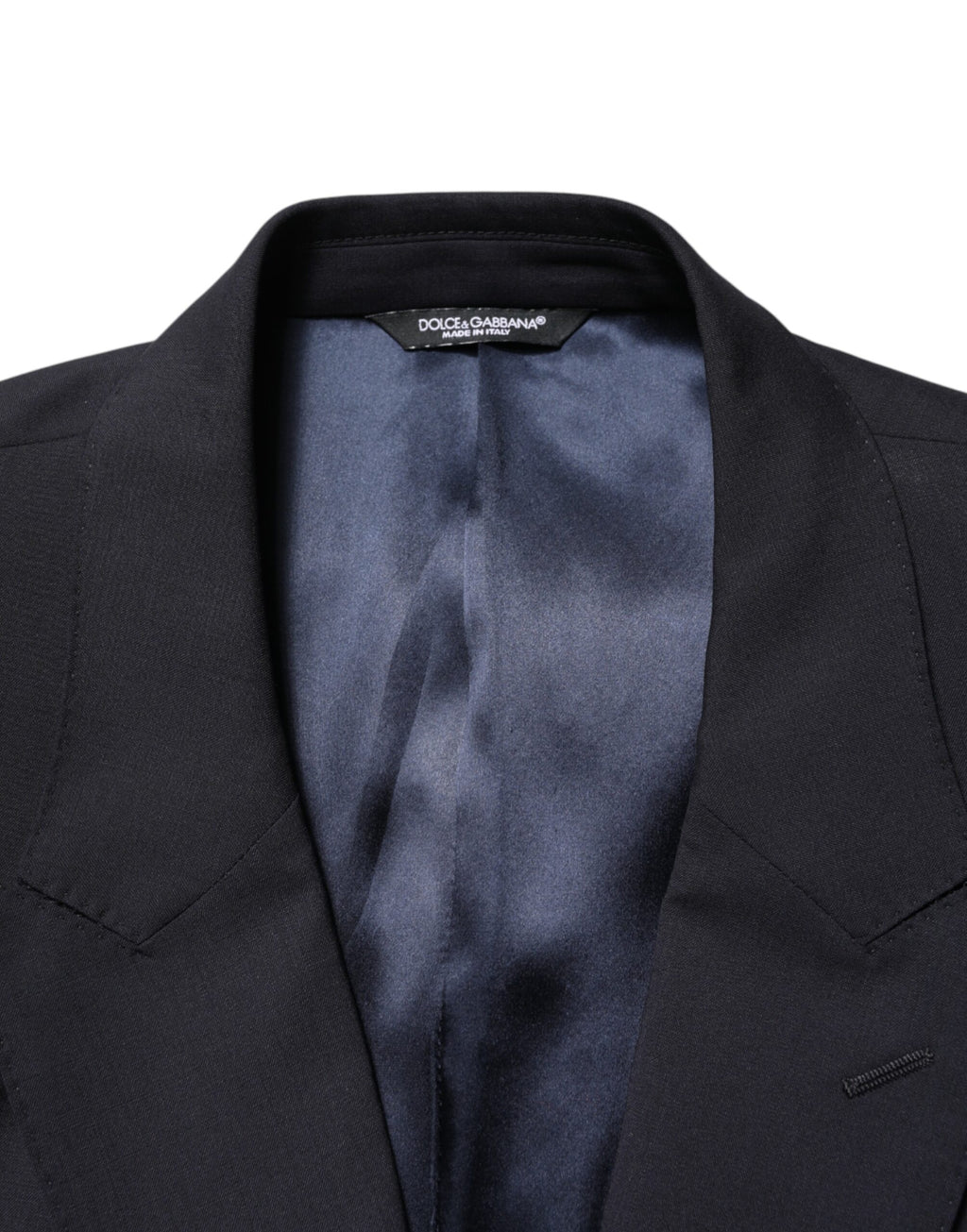 Costume deux pièces Dolce & Gabbana Blue MARTINI à double boutonnage, élégant et moderne, vu en gros plan.