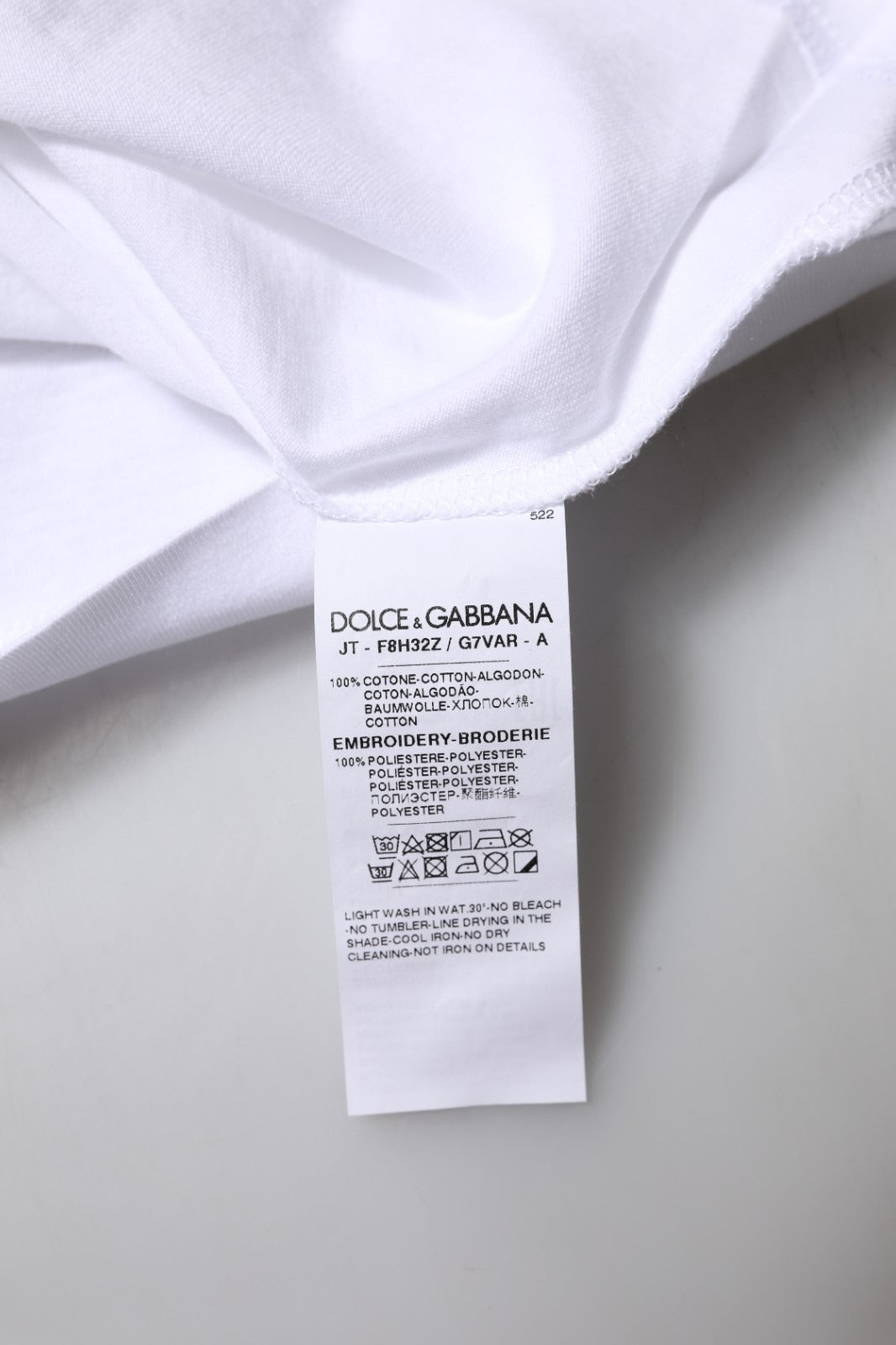 T-shirt blanc Dolce & Gabbana Eleganza en coton avec col rond, vue de face, style décontracté et élégant.