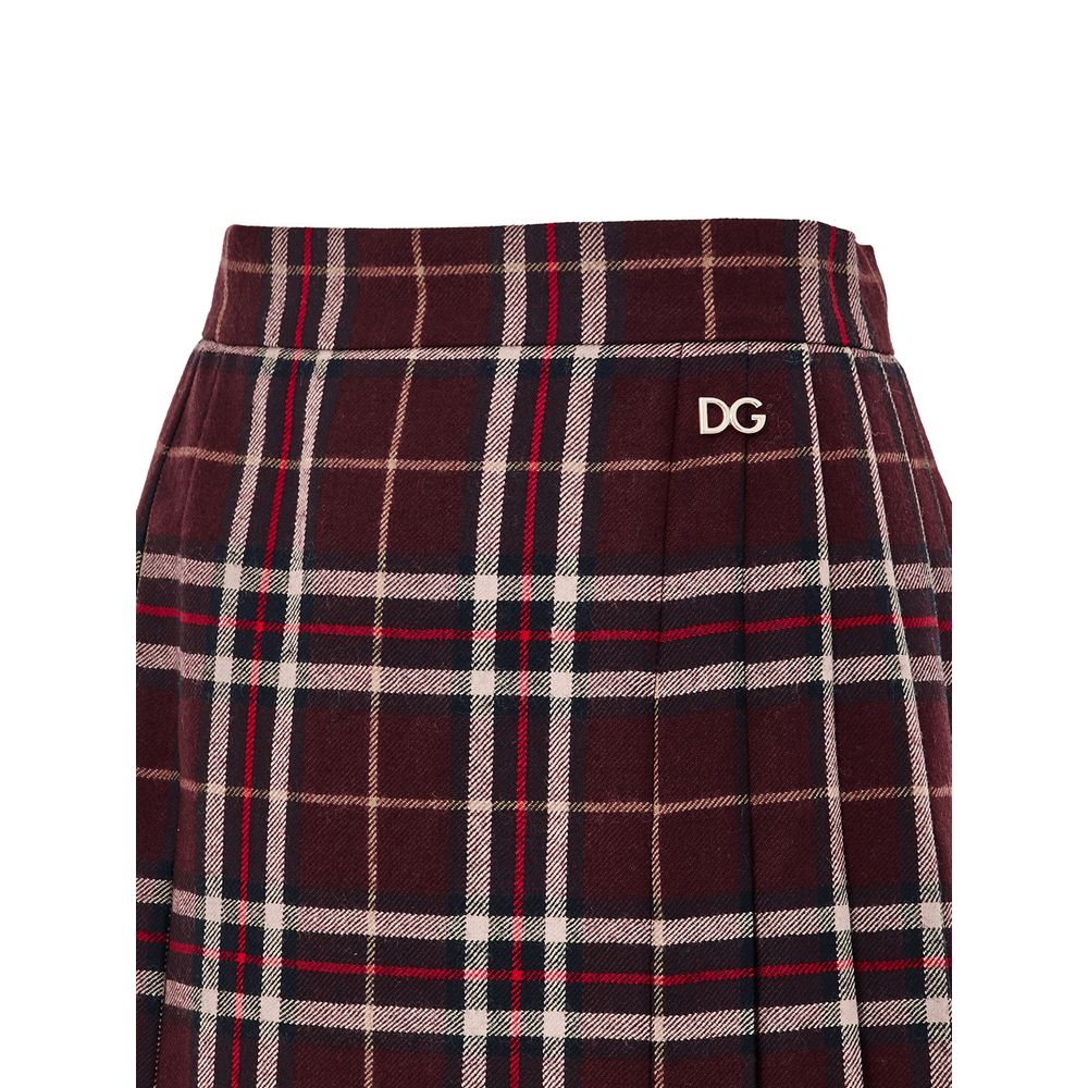 Jupe courte en laine bordeaux Dolce & Gabbana, coupe mini, avec détails élégants et style sophistiqué.