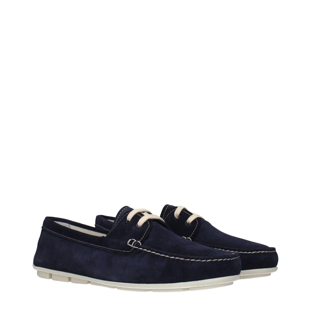 Chaussures Prada en cuir bleu, mocassins slip-on élégants pour homme, avec finition lisse et semelle en caoutchouc.