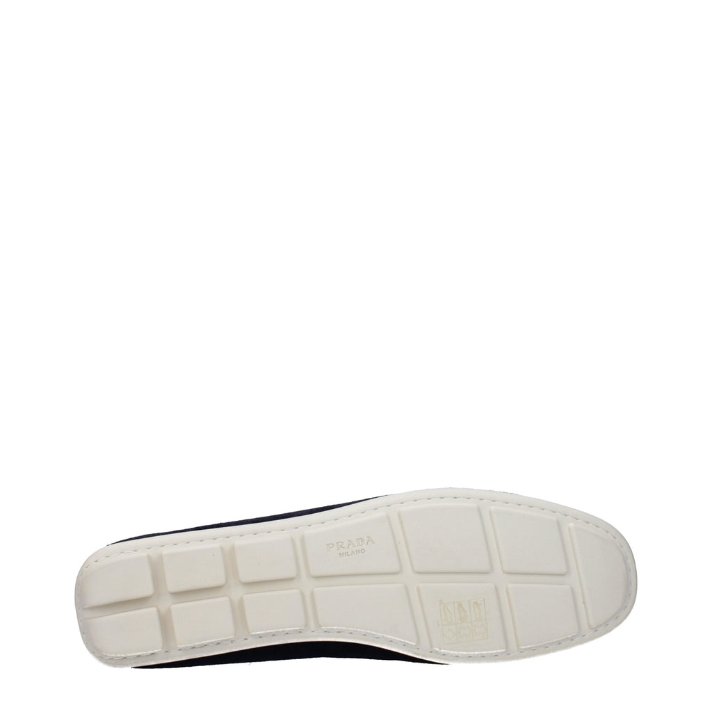 Chaussures mocassins en cuir bleu Prada pour homme, style slip-on, avec finition élégante et semelle en cuir.