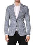 Blazer homme Dolce & Gabbana en coton bleu à motif, à simple boutonnage, porté sur mannequin.