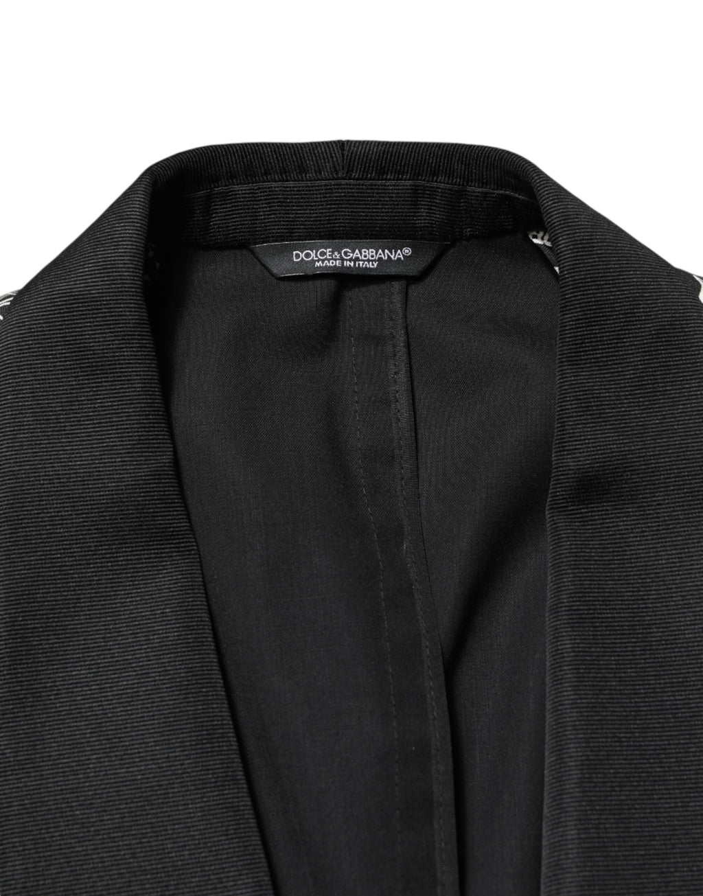 Blazer noir en soie Dolce & Gabbana Jazz Club, coupe simple, avec boutons sur le devant et col classique.