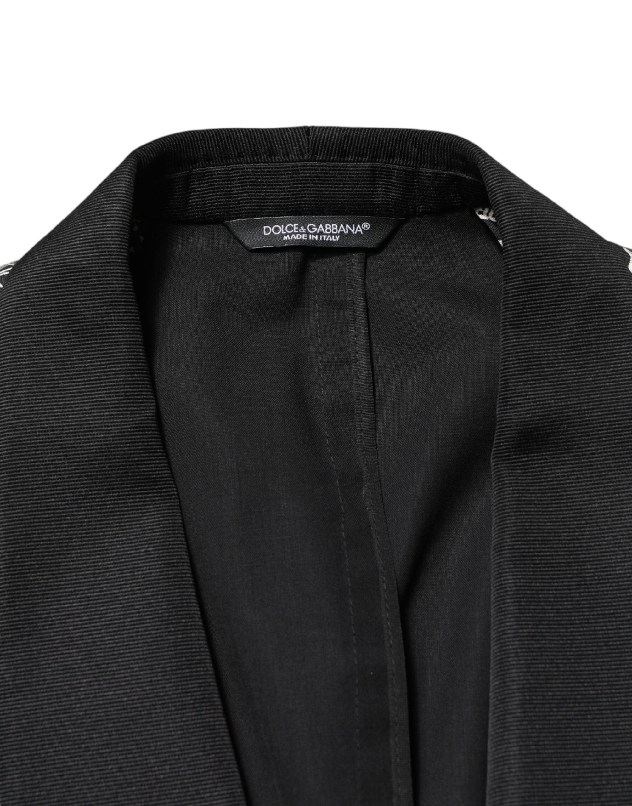 Blazer noir en soie Dolce & Gabbana Jazz Club, coupe simple, avec boutons sur le devant et col classique.
