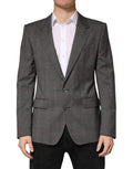 Veste blazer en laine grise à deux boutons Dolce & Gabbana, style classique et élégant, vue de face.