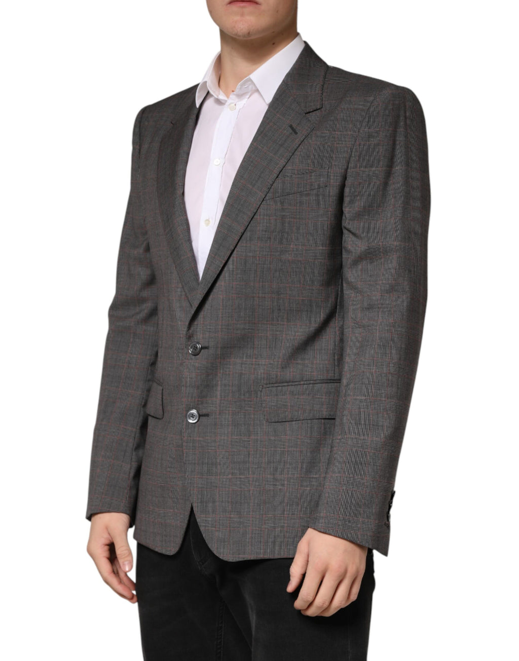 Blazer en laine grise à deux boutons Dolce & Gabbana, coupe ajustée, détails classiques, porté sur mannequin.