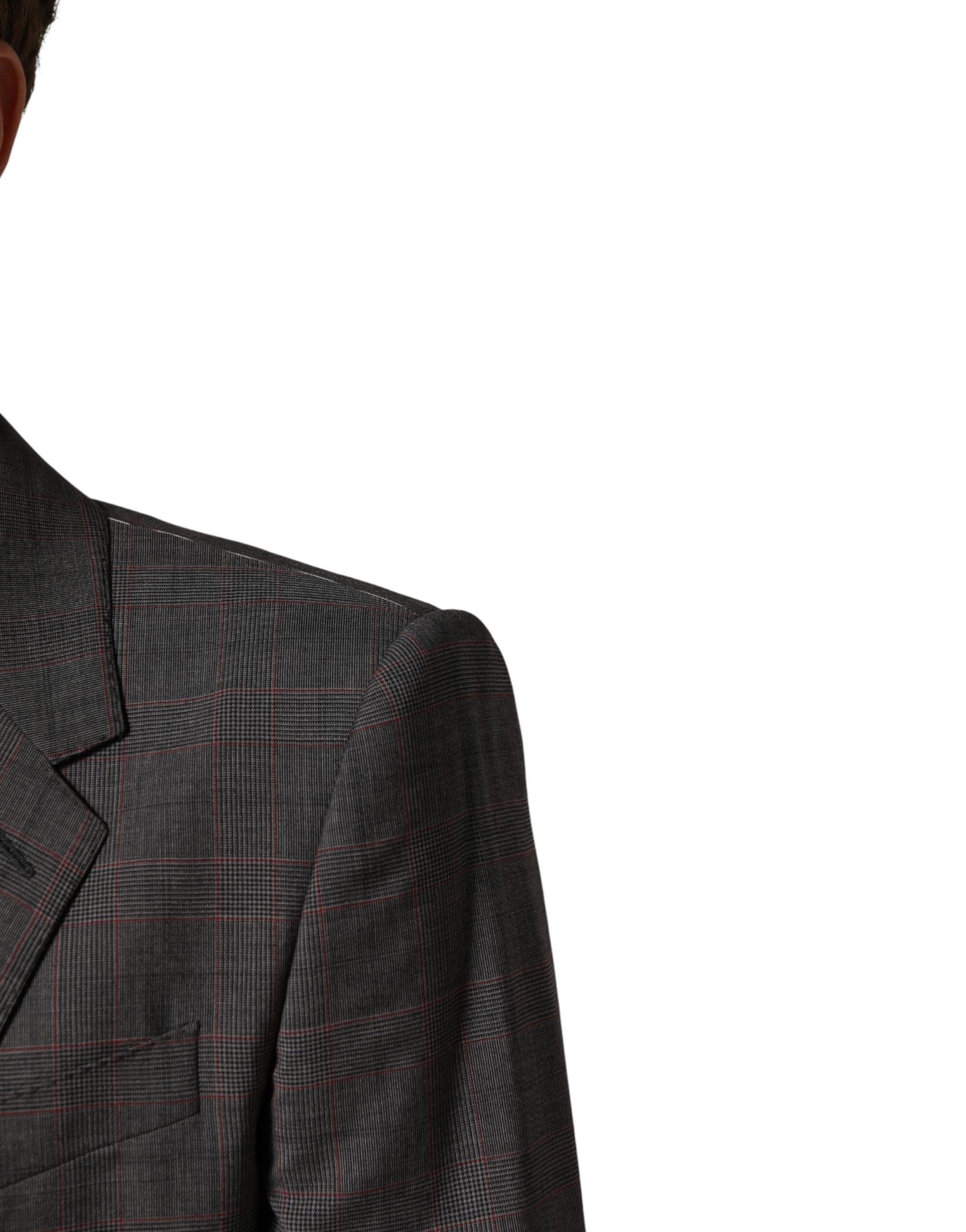 Blazer en laine gris à double boutonnage Dolce & Gabbana, veste masculine élégante, détail des boutons et coupe ajustée visible.