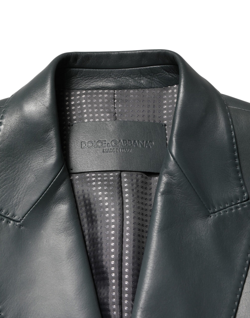 Veste blazer en cuir noir Dolce & Gabbana à double boutonnage et revers, élégante et sophistiquée pour femme.