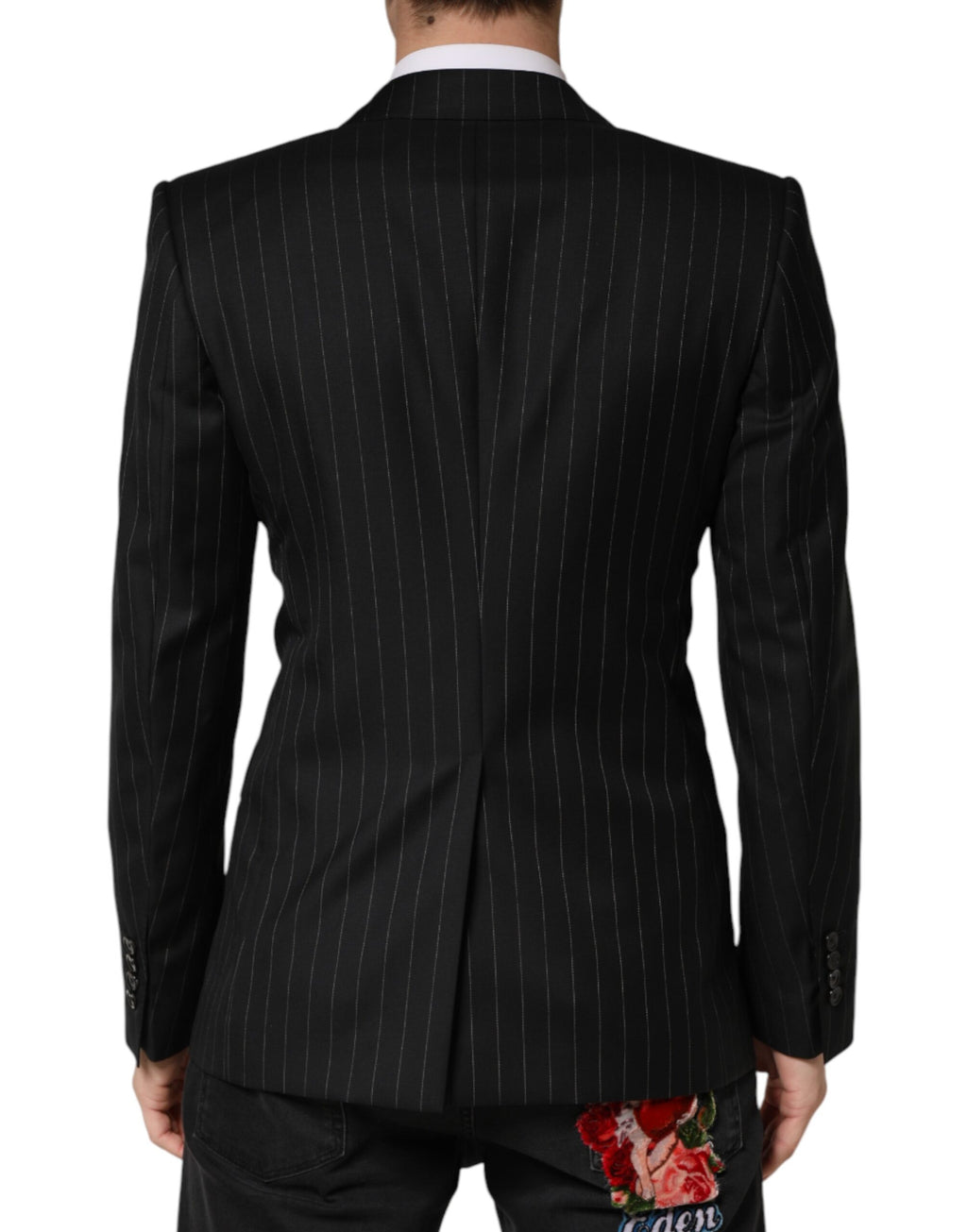 Blazer noir à rayures Dolce & Gabbana, double boutonnage, coupe élégante et moderne, pour un look sophistiqué.