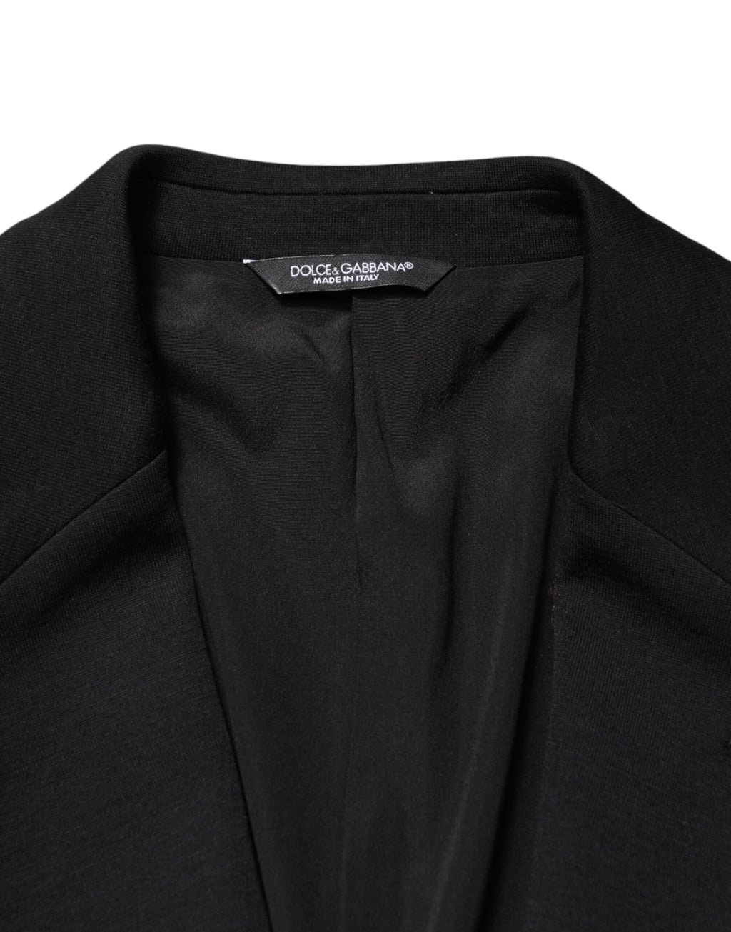 Veste blazer en laine noire à deux boutons Dolce & Gabbana, coupe classique et élégante, vue de face sur un fond neutre.