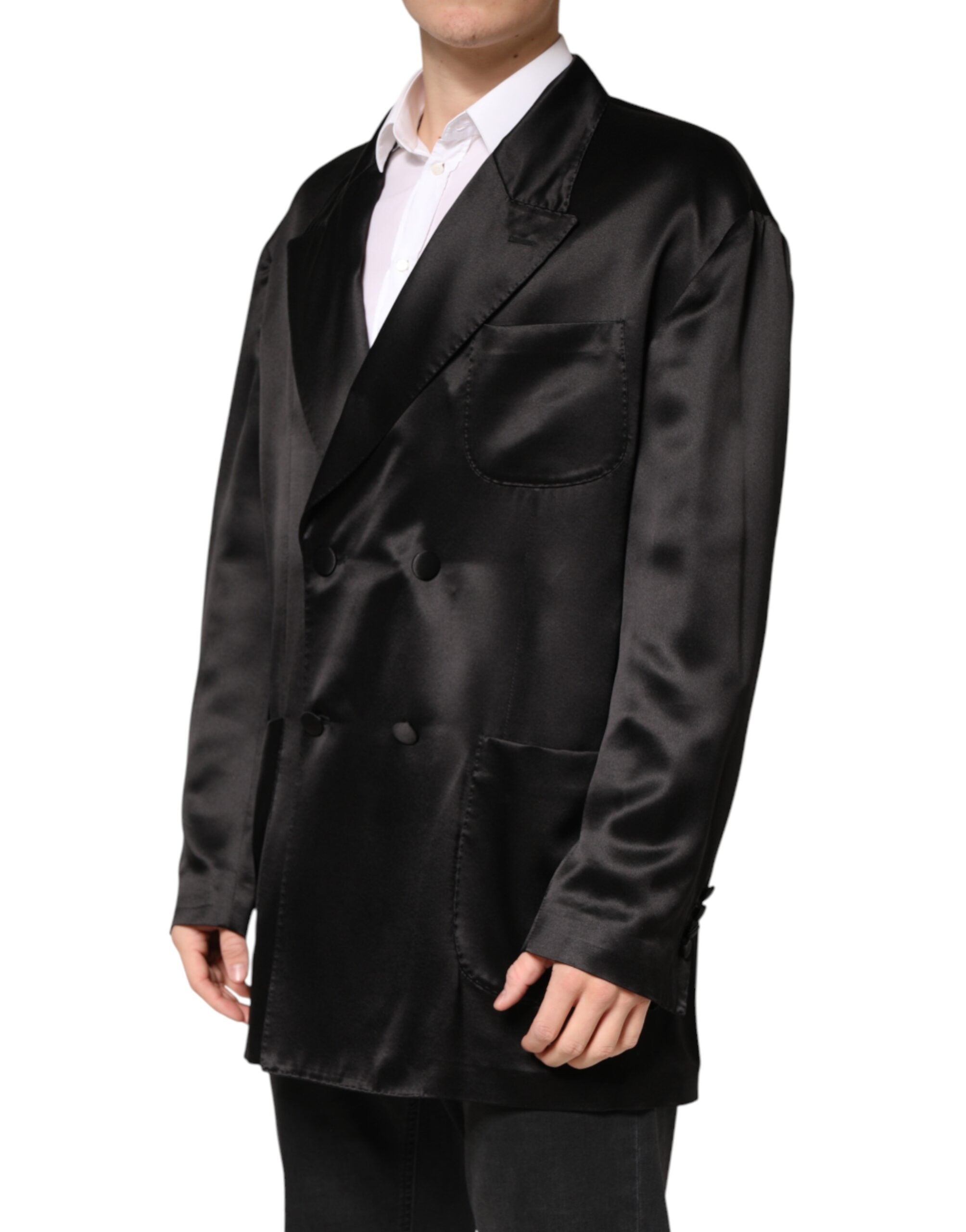 Blazer en soie noire Dolce & Gabbana à double boutonnage, style élégant avec col cranté et boutons dorés.