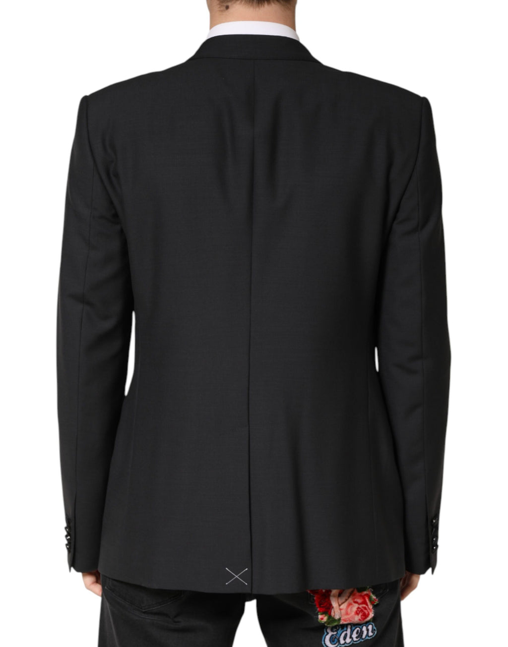Veste blazer noire à boutons simple de Dolce & Gabbana, élégante et classique, vue de face sur fond neutre.