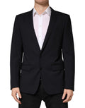 Veste blazer noire en laine Dolce & Gabbana à deux boutons, simple boutonnage et coupe élégante.