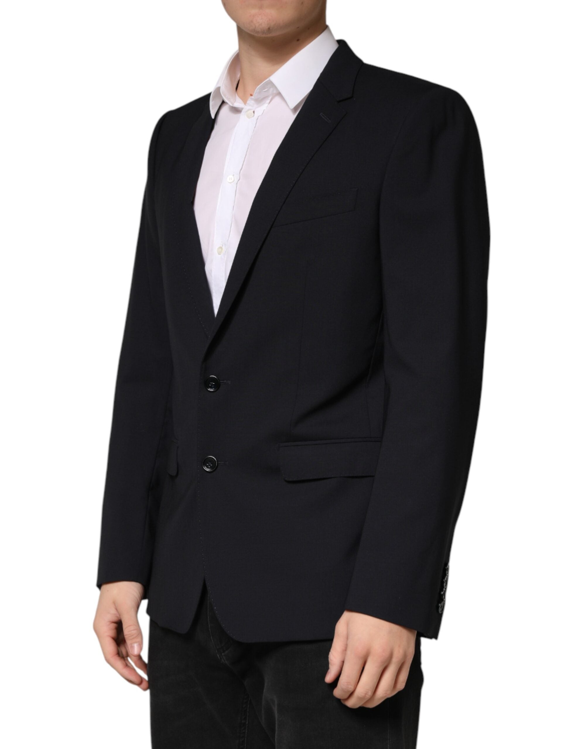 Blazer noir en laine Dolce & Gabbana, à boutonnière simple à deux boutons, porté sur un mannequin.