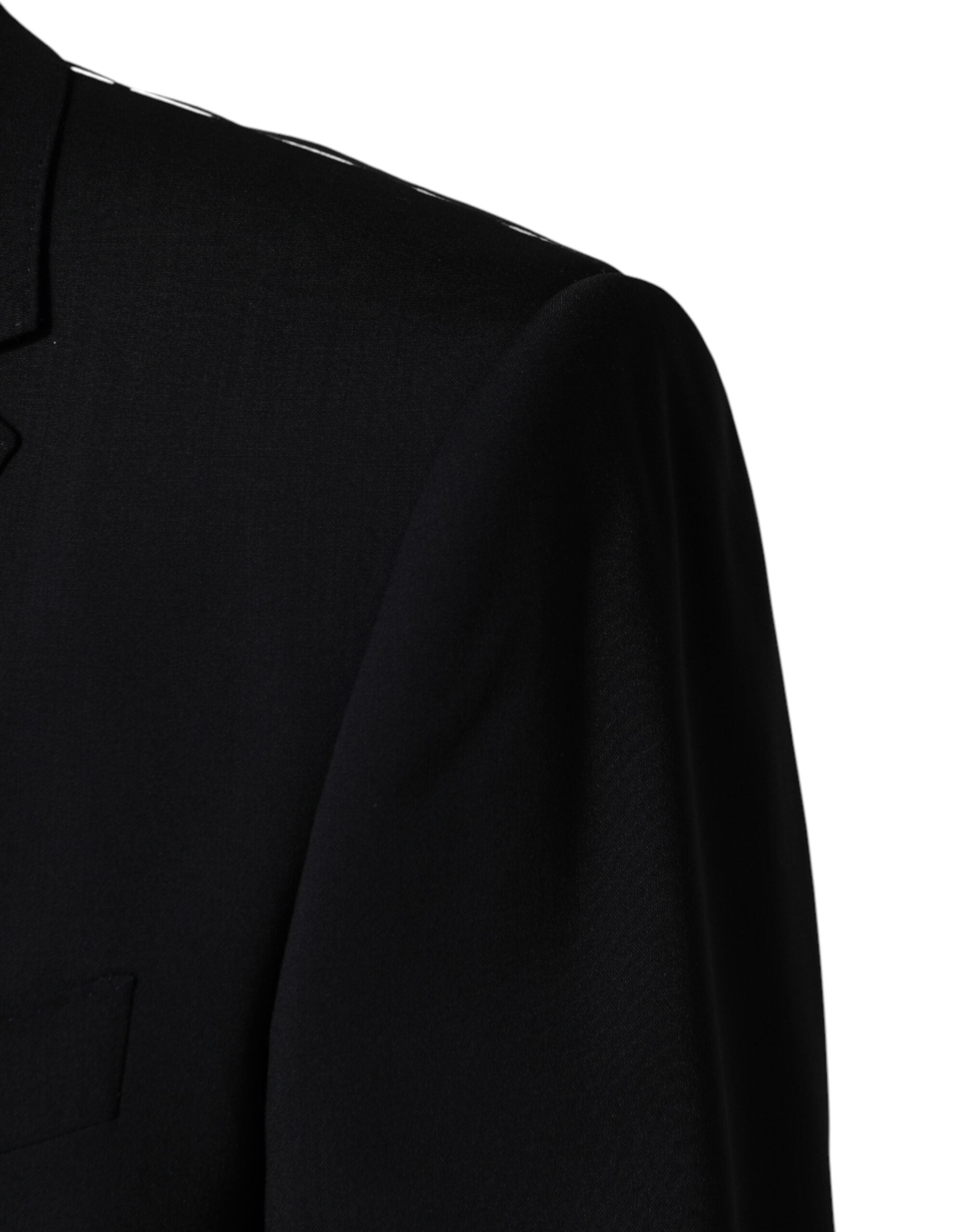 Blazer noir en laine Dolce & Gabbana à deux boutons, coupe single breasted, élégant et sophistiqué.