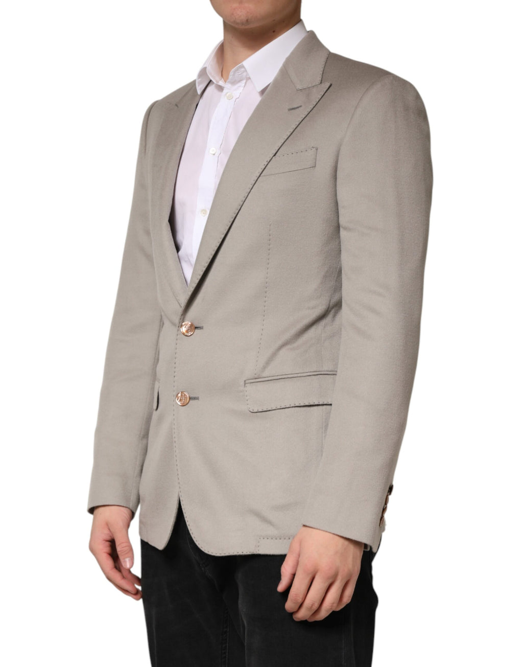 Veste blazer en cachemire gris de Dolce & Gabbana, coupe croisée à simple boutonnage, tissu doux et élégant.