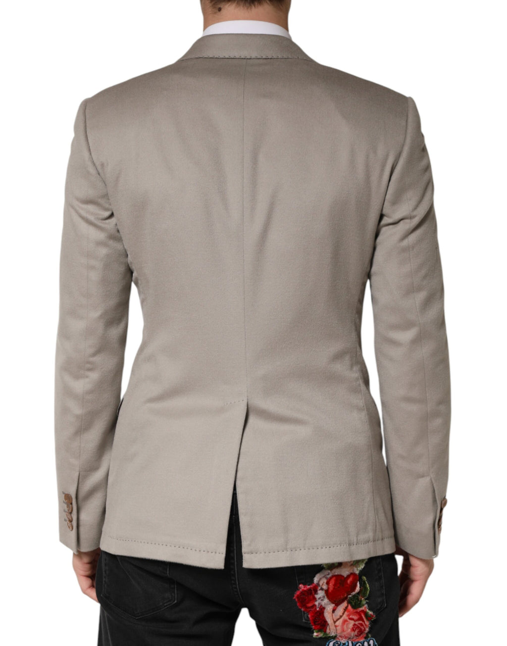 Veste blazer en cachemire gris Dolce & Gabbana, coupe simple boutonnage, détails élégants, tissu doux et raffiné.