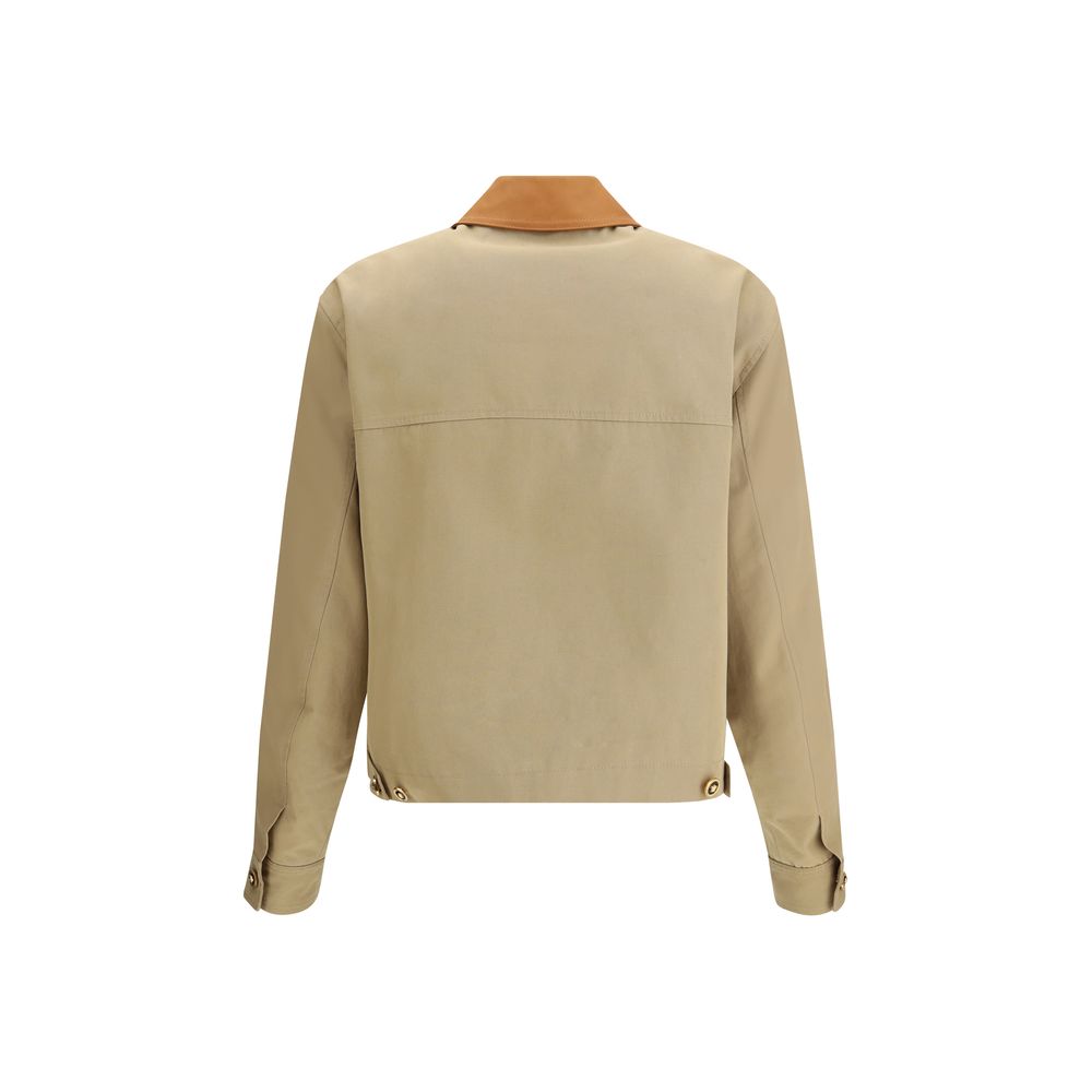 Veste beige en coton de longueur complète de la marque Versace, avec détails élégants et coupe sophistiquée.