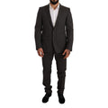 Costume deux pièces en laine vierge noire de Dolce & Gabbana, veste et pantalon élégants pour homme.