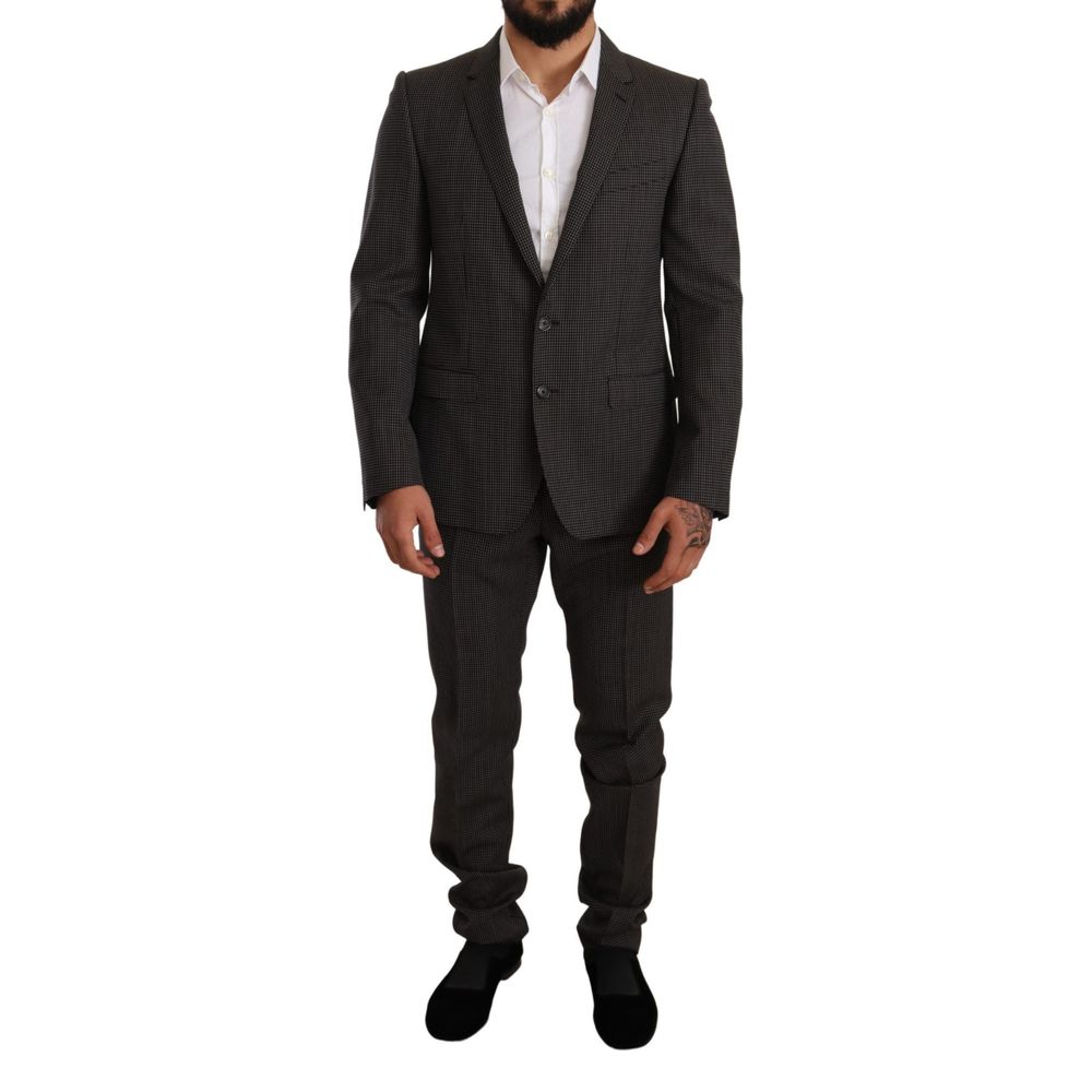 Costume deux pièces en laine vierge noire de Dolce & Gabbana, veste et pantalon élégants pour homme.