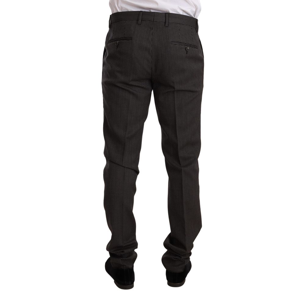 Costume deux pièces en laine vierge noire Dolce & Gabbana, veste et pantalon élégants, pour homme.