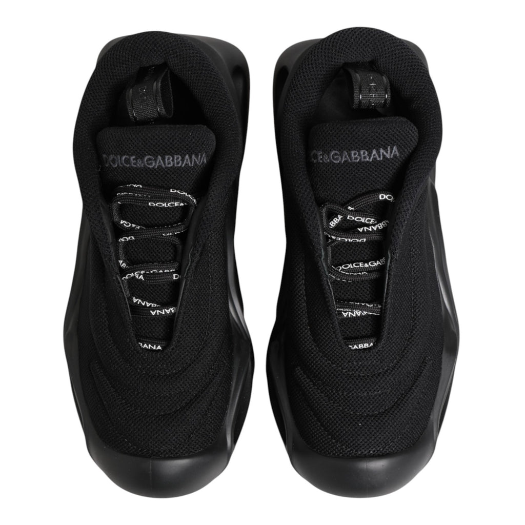 Baskets basses Dolce & Gabbana Noires Slip On à motif vague, confortables et modernes, en cuir avec semelle blanche.