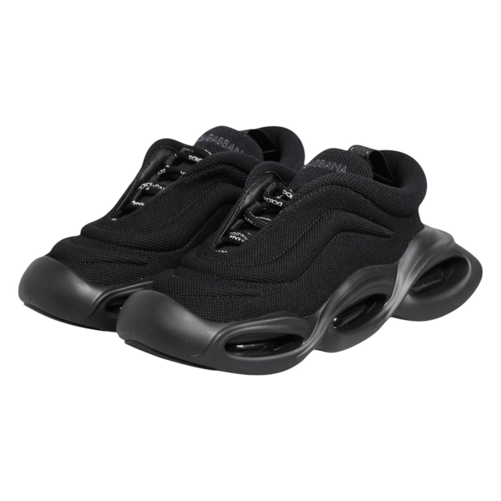 Chaussures Dolce & Gabbana sneakers basses noires à vagues, slips-on, style décontracté et tendance pour homme.