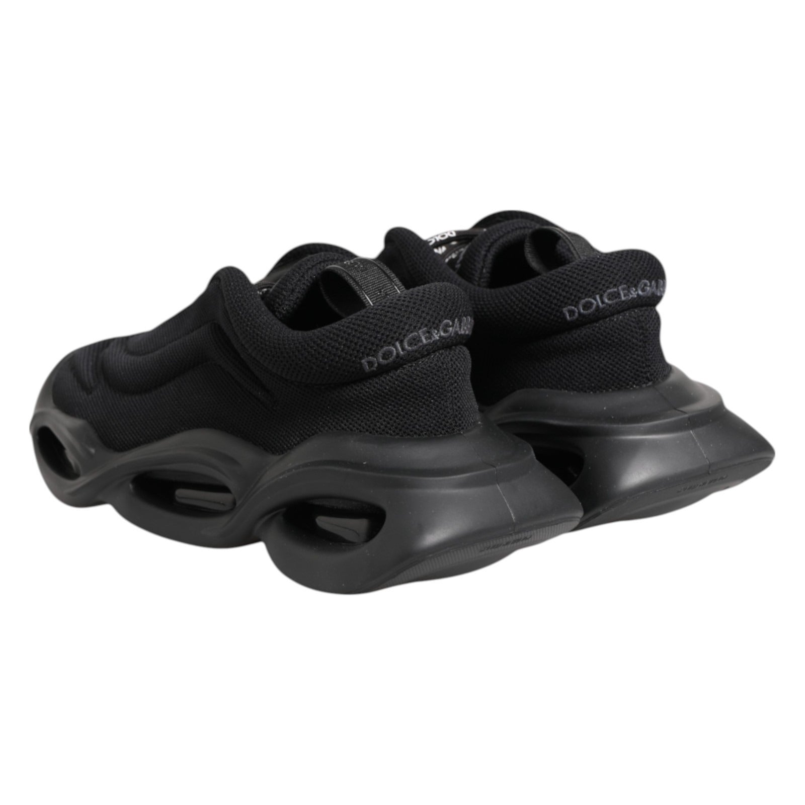 Chaussures Dolce & Gabbana sneakers basses noires Slip On avec motif vague, vue de côté.
