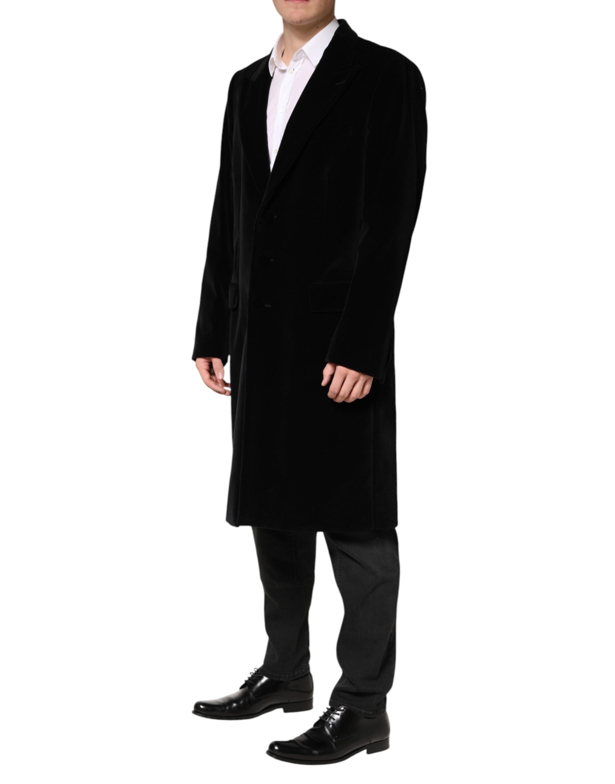 Manteau trench long en velours de coton noir Dolce & Gabbana, élégant et sophistiqué, porté sur un mannequin.