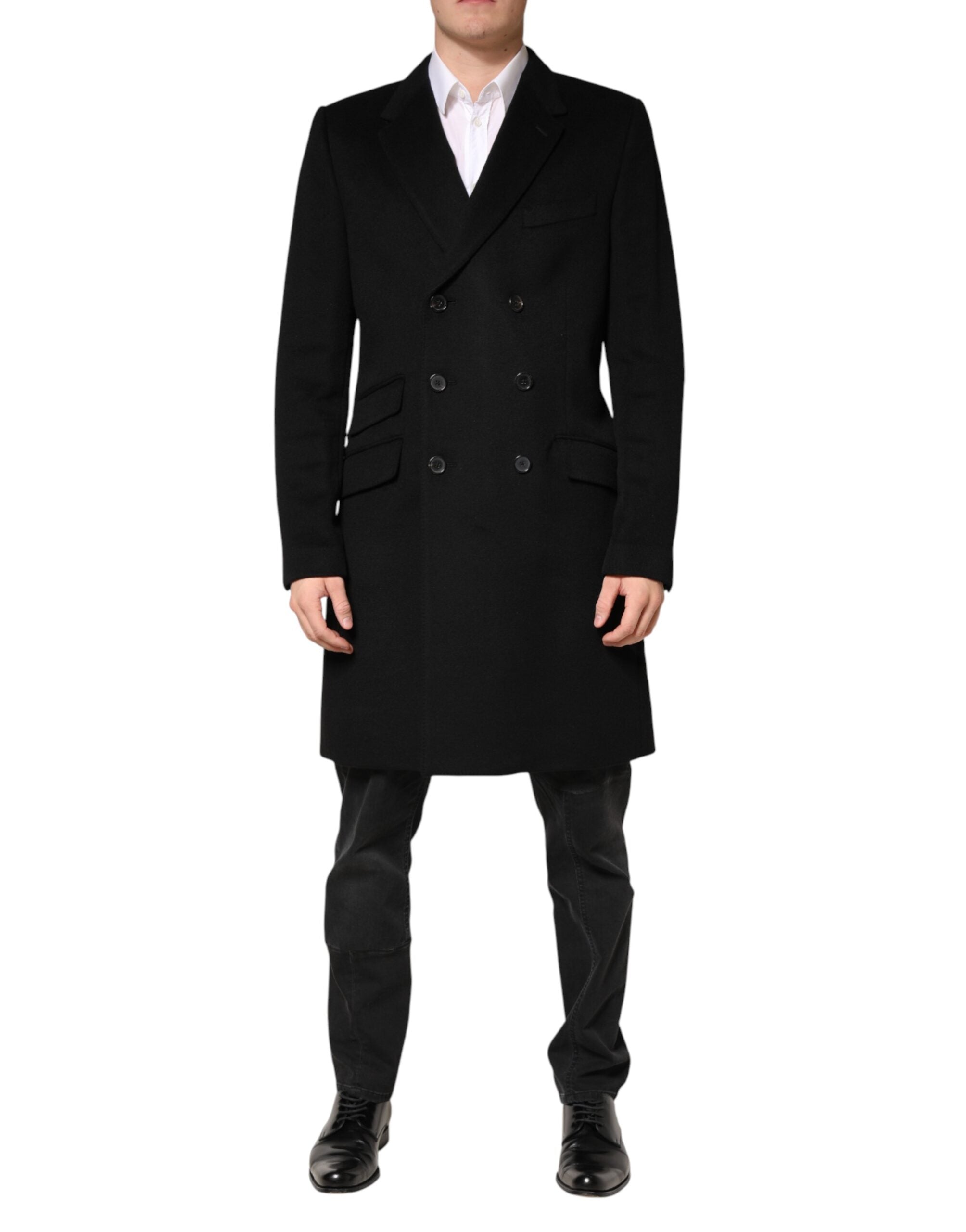 Manteau trench en laine noire à double boutonnage de Dolce & Gabbana, style élégant et sophistiqué, porté sur un mannequin.