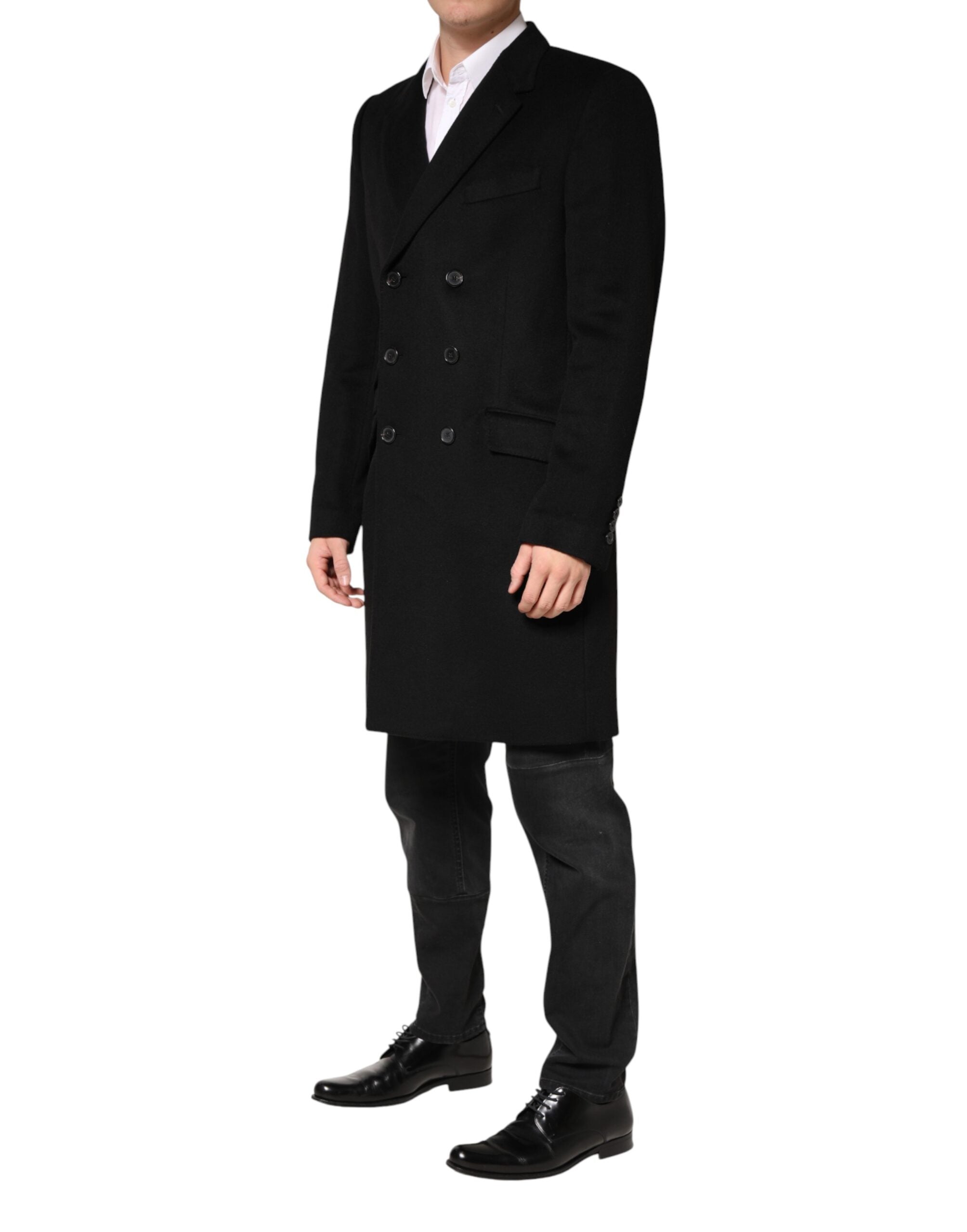 Manteau trench en laine noire Dolce & Gabbana à double boutonnage, élégant et sophistiqué, porté sur un mannequin.