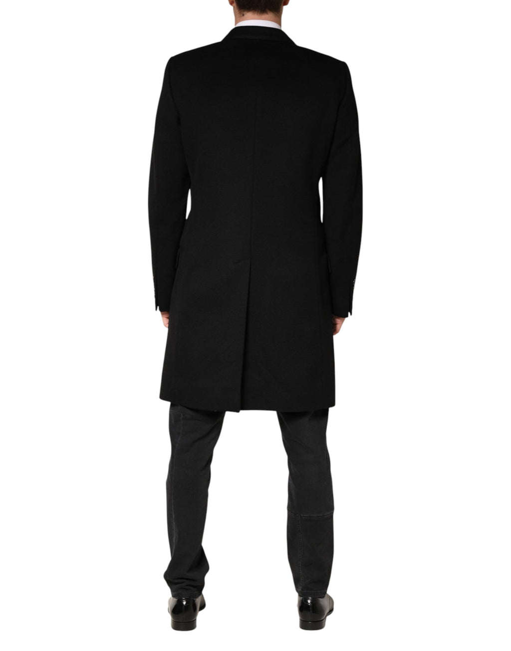 Manteau trench double boutonnage en laine noire Dolce & Gabbana, coupe élégante et classique, porté sur un mannequin.