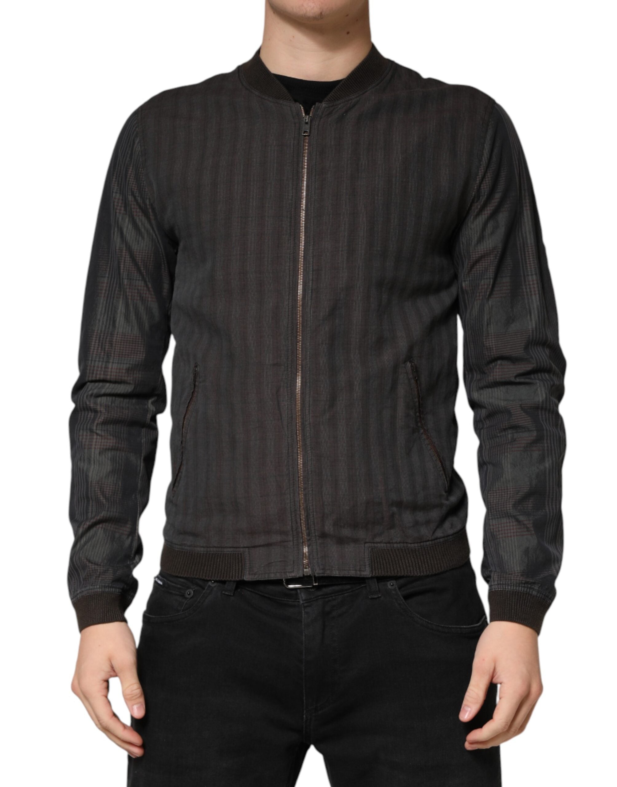 Veste bomber noire en coton à rayures, fermeture éclair complète, de la marque Dolce & Gabbana, visible en gros plan.