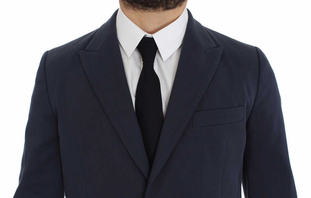 Blazer décontracté en coton extensible bleu de Dolce & Gabbana, style casual, visible avec col et boutons.