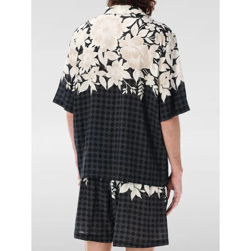 Chemise amiri en soie noire à manches courtes avec motif floral crème et design géométrique à pois