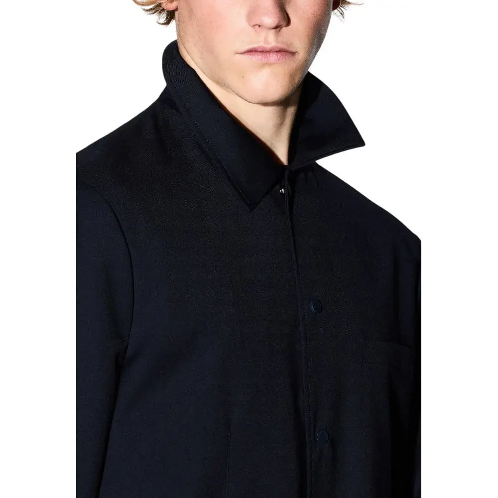Blazer noir en polyester armani exchange avec col structuré et texture subtile pour un look élégant