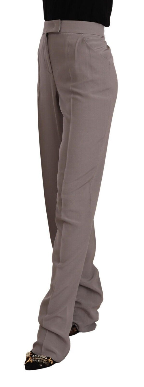 Pantalon long en soie marron à taille haute de coupe tapered, de la marque Armani, visible en détail dans l'image.