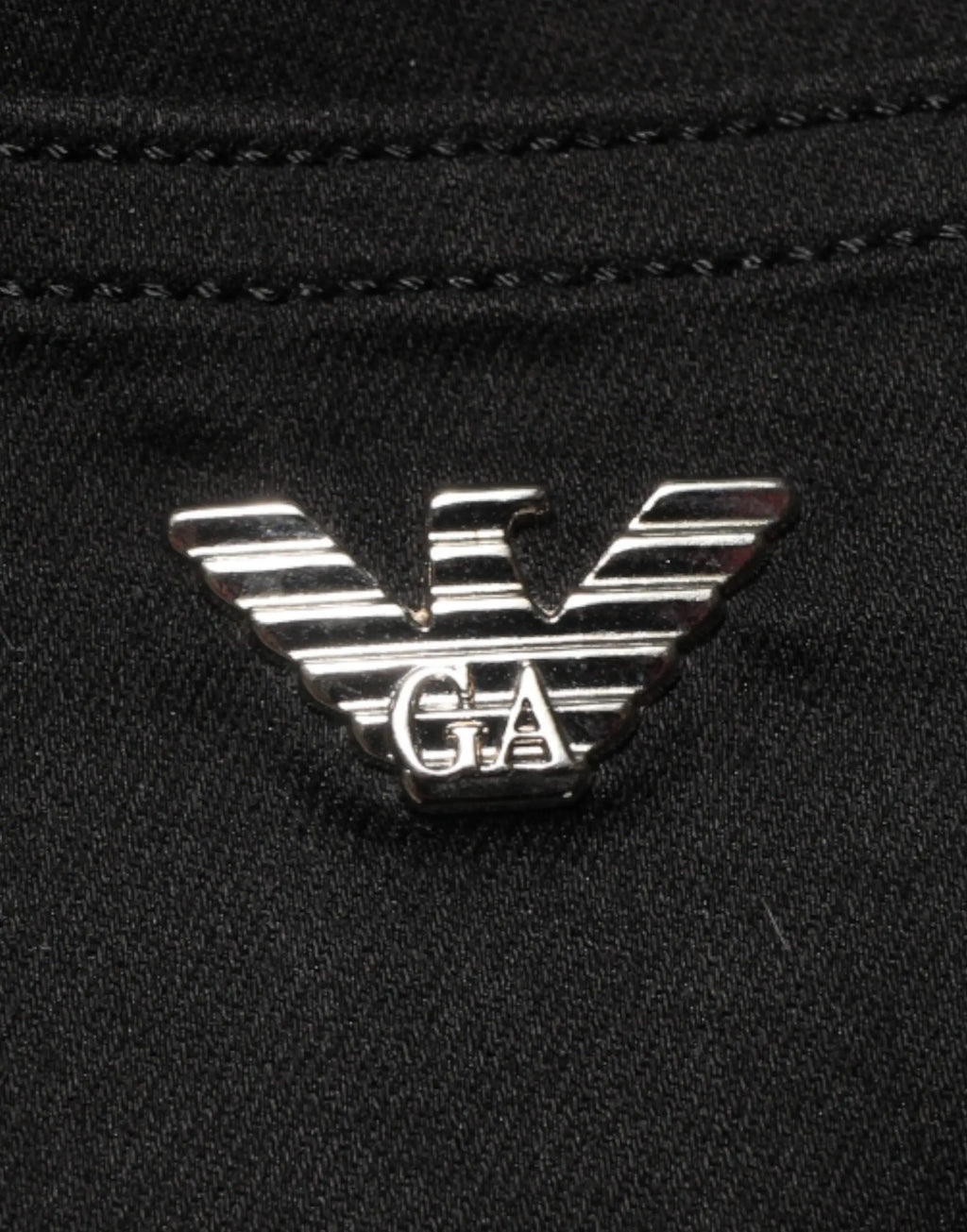 Logo aigle argenté avec initiales ga et finition métallique sur jean skinny en coton extensible noir armani jeans