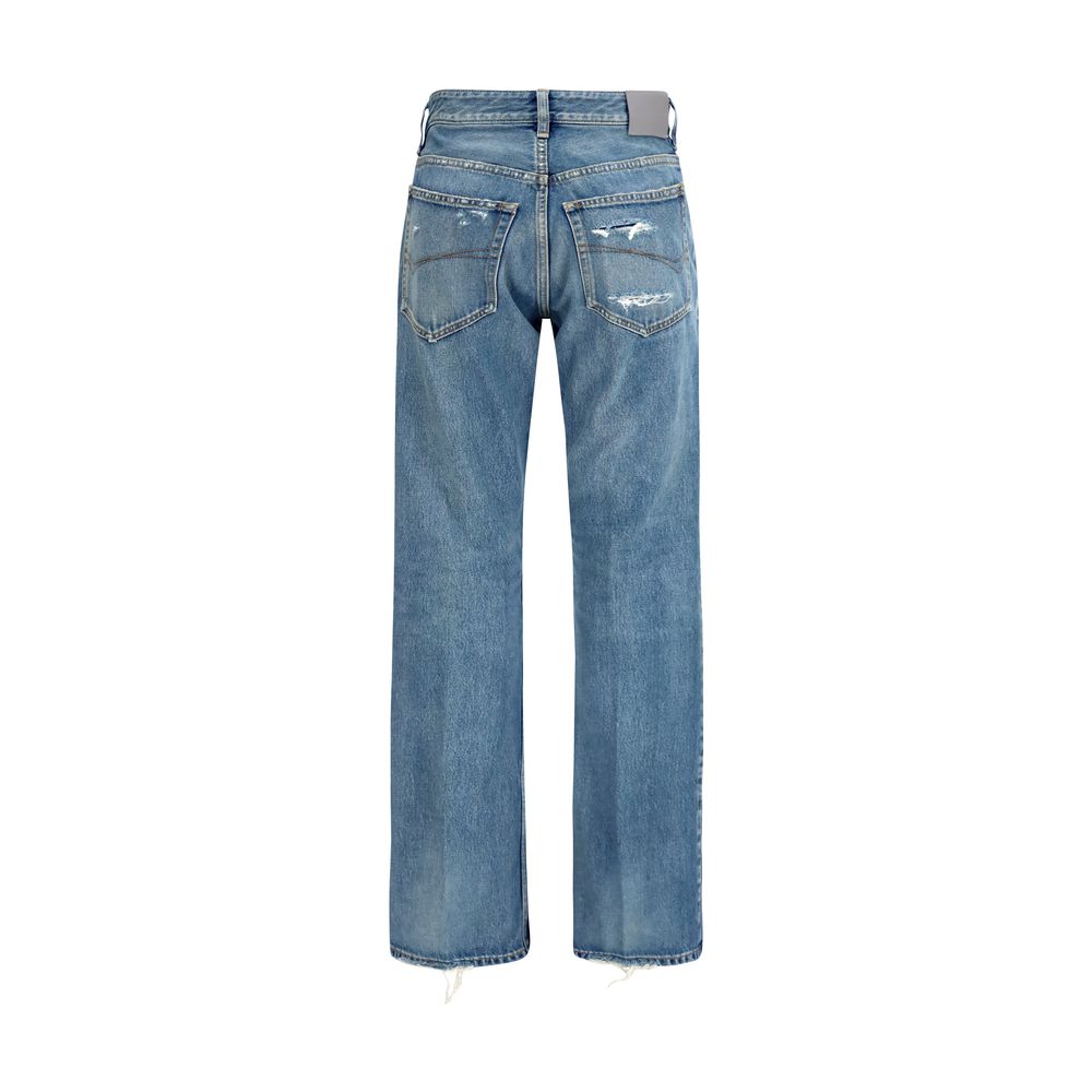 Jeans droits en coton bleu de Balenciaga, style moderne avec coupe droite, visibles sur un mannequin.