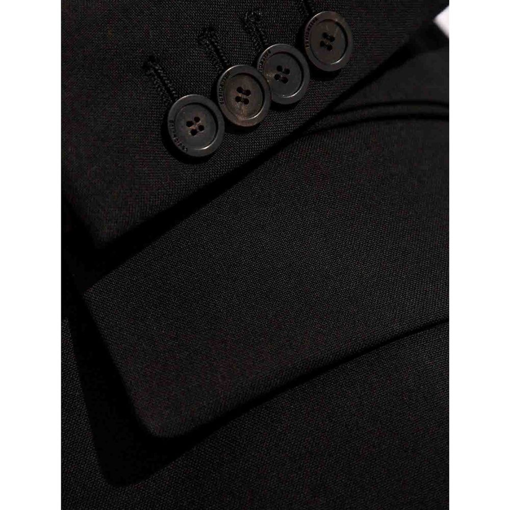 Veste longue en laine noire Balenciaga avec col et boutons, portée sur un mannequin.