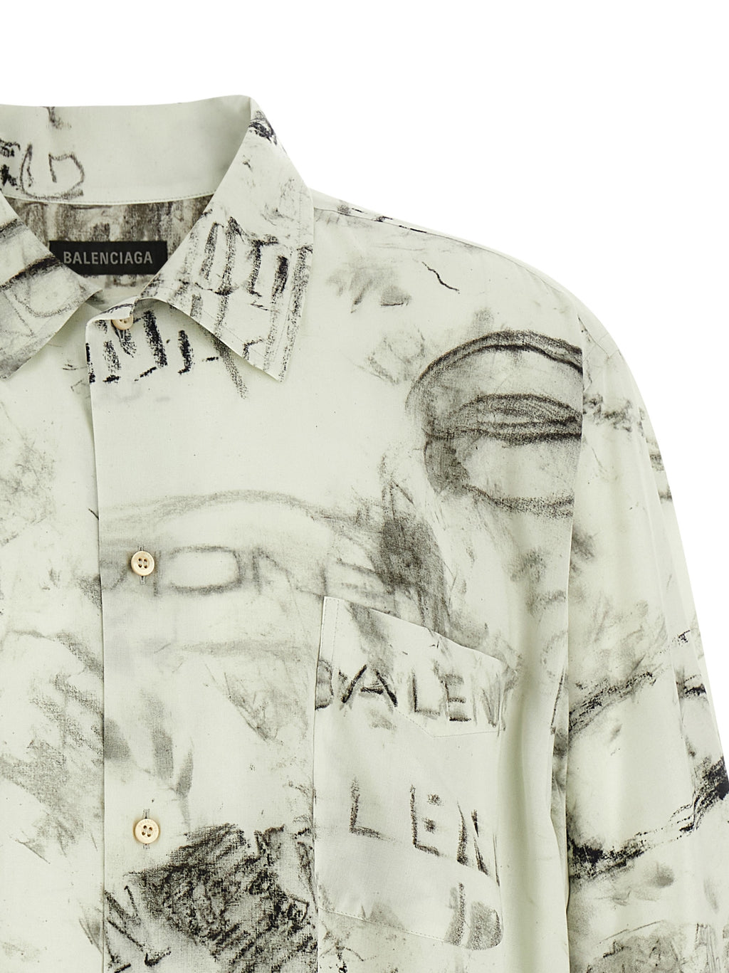 Blouse gris en viscose de la marque Balenciaga, coupe élégante, avec col et manches longues visible sur l'image.