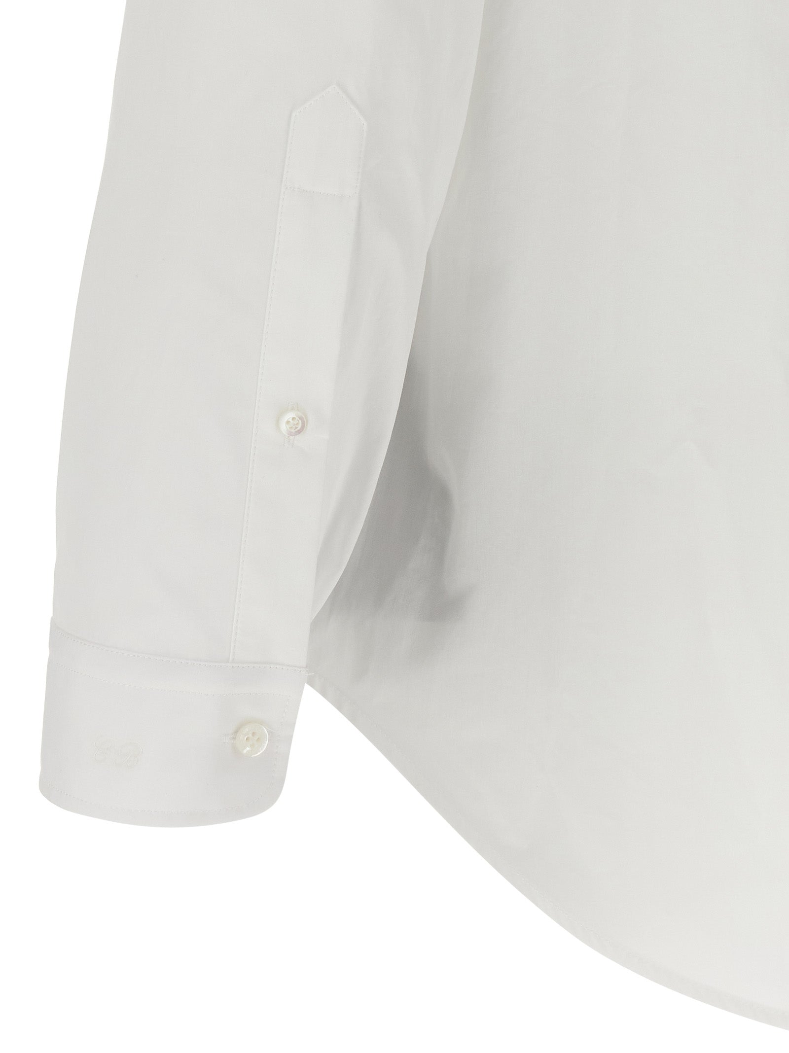 Chemise en coton blanche de Balenciaga, vue de face, avec col classique et manches longues, élégante et sophistiquée.
