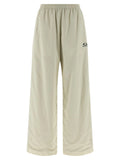 Pantalon de survêtement balenciaga beige en polyamide à jambes larges avec taille élastique et petit logo noir