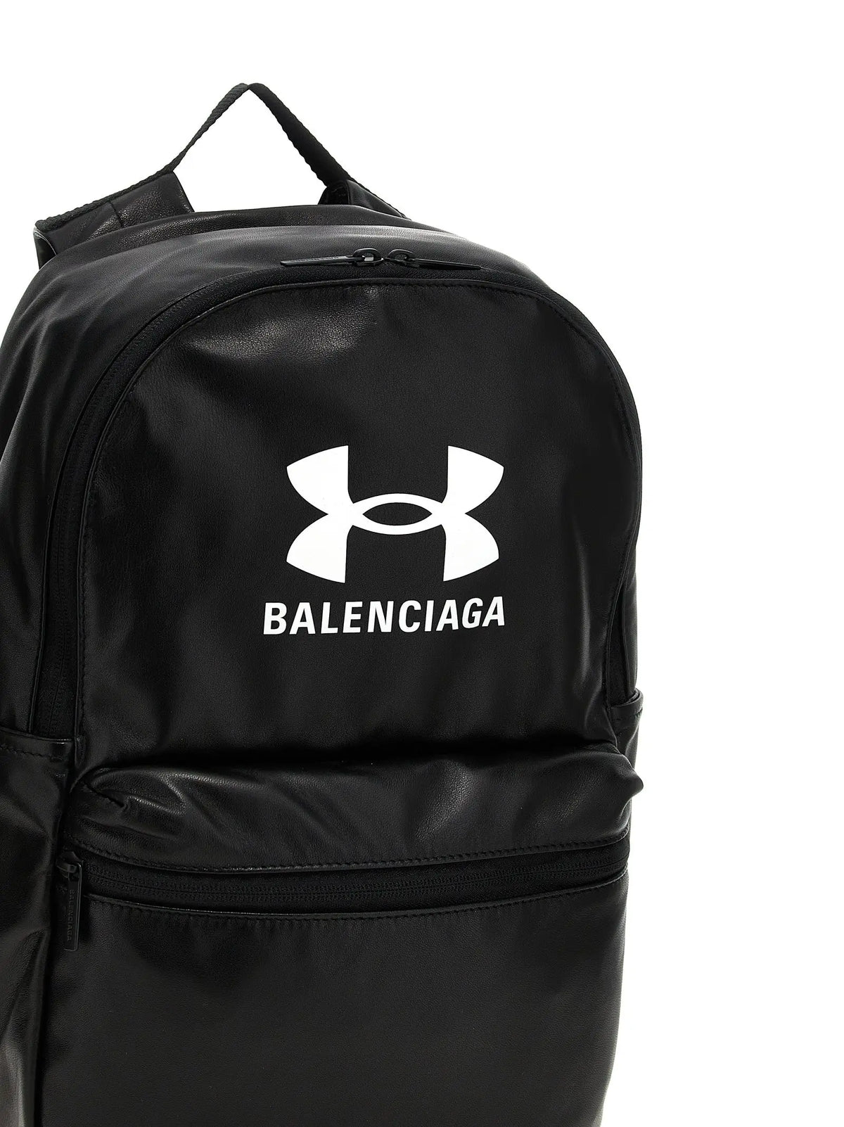 Sac à dos balenciaga bicolor en cuir dagneau noir avec logo blanc brillant sous armour x balenciaga sur le devant